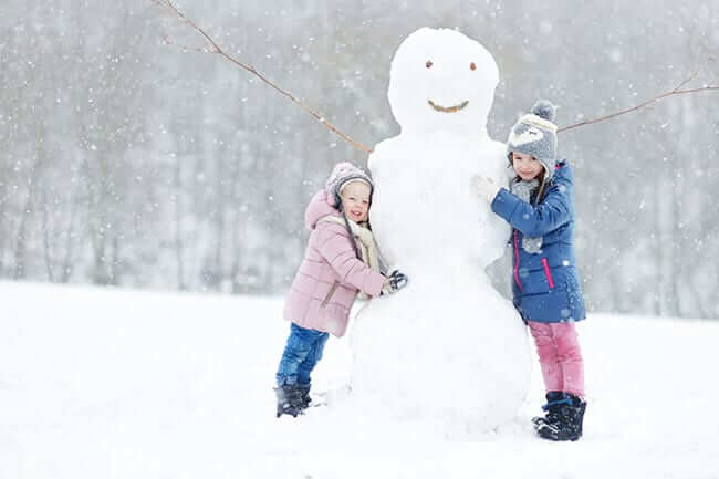 children making snowman